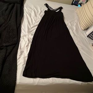 Woman’s black Calvin Klein maxi dress